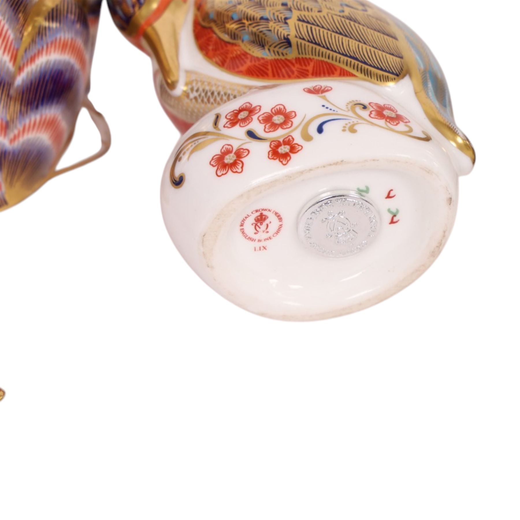 Royal Crown Derby paperweights, including Platypus gold stopper, Kingfisher silver stopper and four others without stoppers