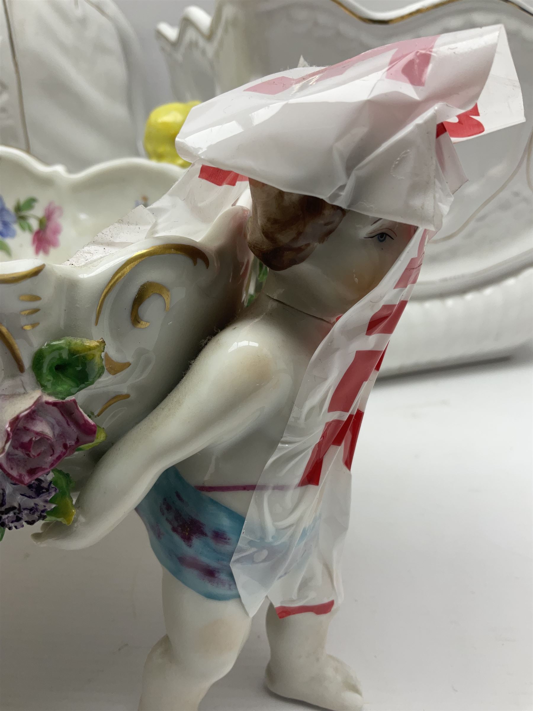 White glazed elephant jardiniere stand; Capo di Mote table centre-piece; and French game-pie dish