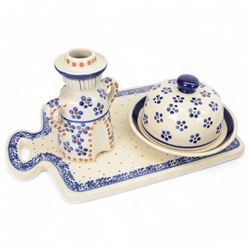 Collection of Ceramika Artystyczna Boleslawiec ceramics and similar Polish ceramics, including cheese dome in the form of a lady, chopping board, fruit bowl and figural candlestick