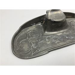 Archibald Knox (1864-1933) for Liberty & Co Tudric pewter inkwell, of shaped oval form with central lidded inkwell, cast with foliate tendrils, impressed beneath Tudric 0404, L22.5cm