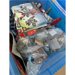Collection of Lego, including built Bionicles Mistika models with instructions, loose Lego pieces, Lego Beatles Abbey Road canvas print and a Lego head storage box