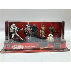 Star Wars - Disney Store The Force Awakens figurine playset, Poe's X-Wing Fighter, Snowspeeder and First Order Tie Fighter; Solo figurine set; The Last Jedi Elite Series die-cast action figure of Praetorian Guard; all mint and boxed; together with Star Wars Episode 1 card game, boxed (7)