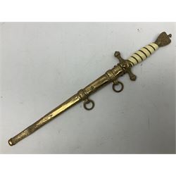 WW2 German kreigsmarine style dagger composed from various age parts, the post-war 25cm double fullered blade  with etched decoration and inscribed WKC with knight's head; in gilt brass scabbard with two rings L42cm overall