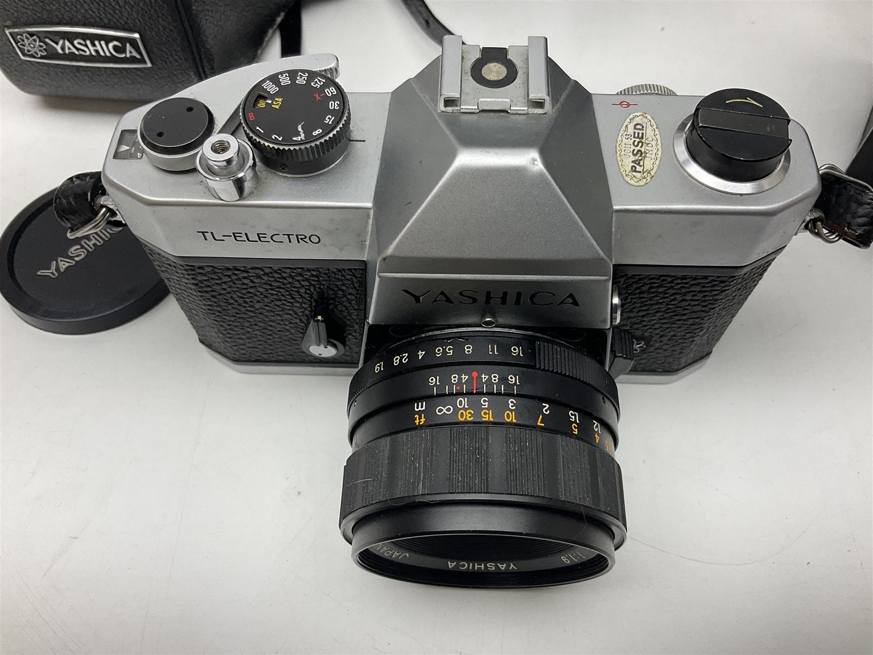 Yashica-A camera body, serial no. A4080073, with 'Yashikor 1:3.5 f=80mm' lens, serial no. 209272 and 'Yashikor 1:3.5f=80mm' lens, serial no 22942, together with Yashica TL-Electro camera body, serial no. 5054162 with 'Yashinon-DS 50mm 1:1.9  40056038