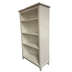 White painted open bookcase, fitted with three shelves