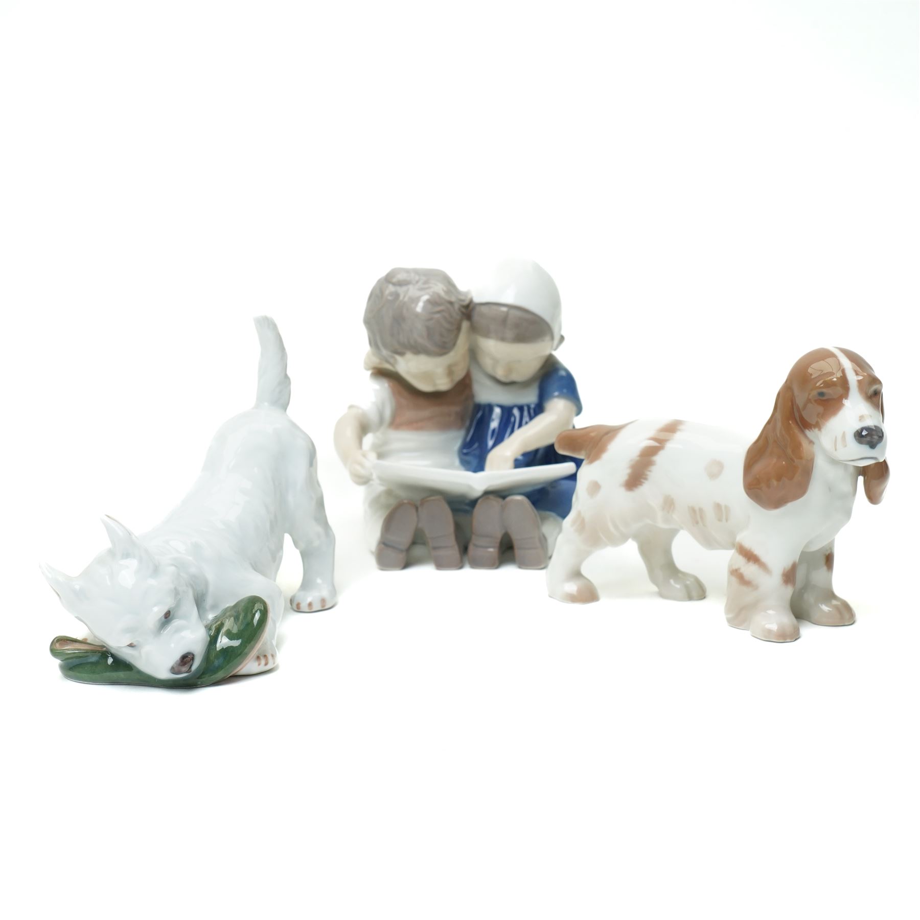 Bing & Grondahl figure of two children reading 1567,  Copenhagen boy wearing a raincoat, two Copenhagen dogs and a Karl Ens Kingfisher group (5)