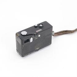 Two Rollei 35mm compact film cameras made in Singapore, the first  a Rolleimat F with Rolleinon 2.8/38mm lens serial no. 040409150, boxed with instructions, the second a Rollei 35 with Tessar 3.5/40 lens in black finish serial no. 6191471 with a Rollei flash