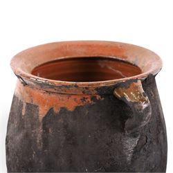 Spanish twin handled cooking pot, blackened to the outside, together with two bowls with slipware glaze, pot H22cm 