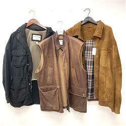 A gentlemen's Orvis brown suede jacket, with check lining, size XXL, together with a gentlemen's Orvis brown leather gilet, size XL, and a further gentlemen's Orvis black jacket, size L. (3). 
