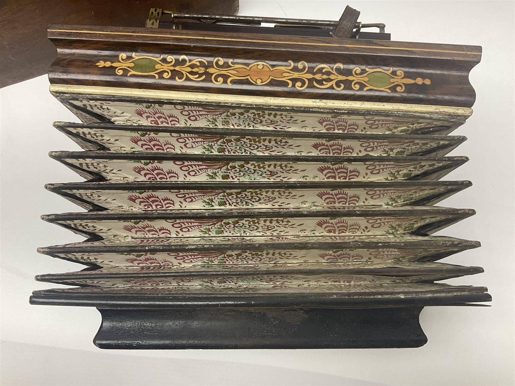 19th Century inlaid rosewood Flutina accordion, stamped Busson of Paris, having sixteen mother of pearl keys and six fold floral decorated bellows L30cm; in baize lined mahogany box