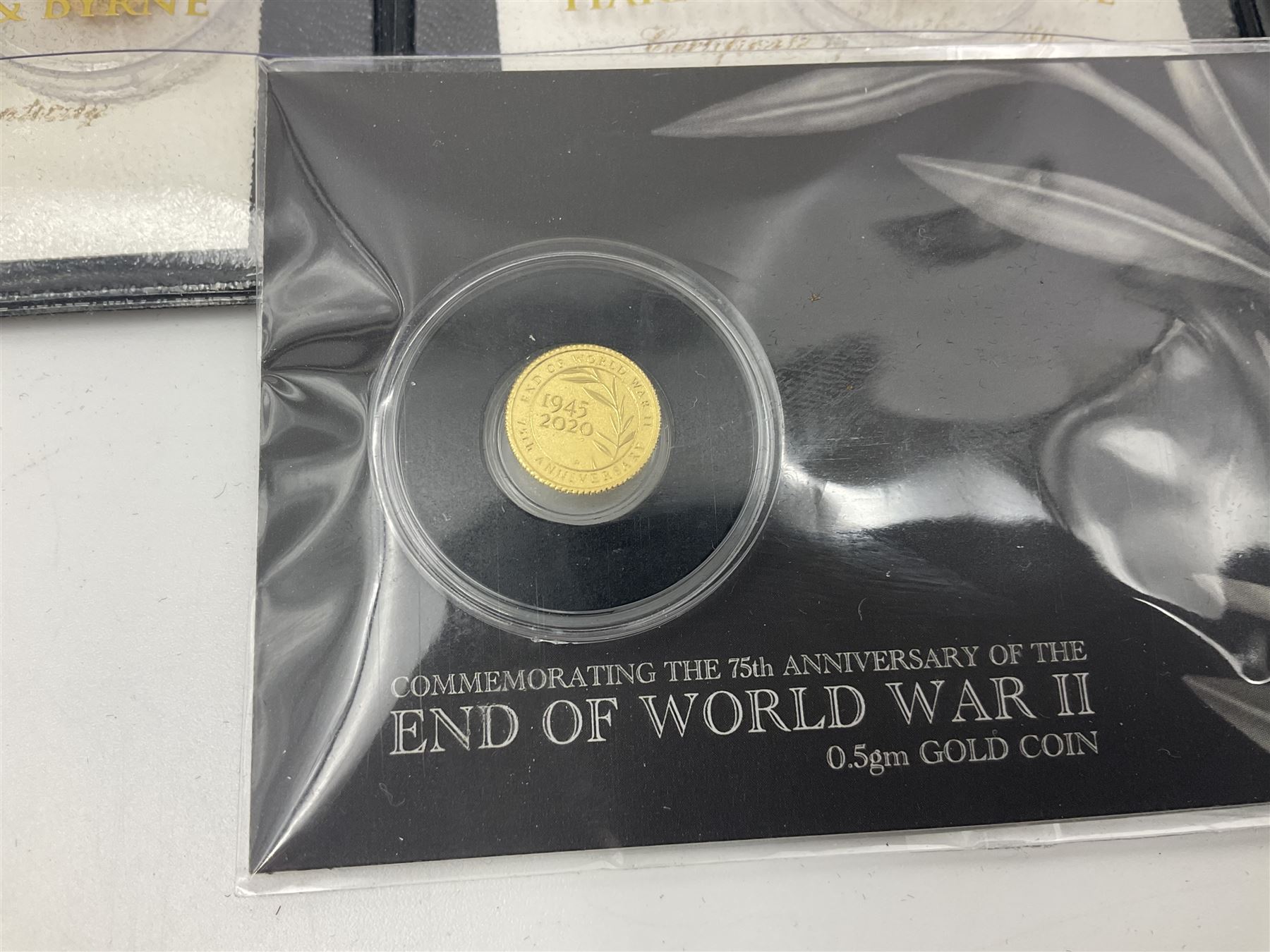 Eleven Queen Elizabeth II miniature gold coins, each being 0.5 grams of 24 carat gold, including Tristan da Cunha 2020 'Laurel', Solomon Islands 2020 '80th Anniversary of the Battle of Britain' etc, all with certificates