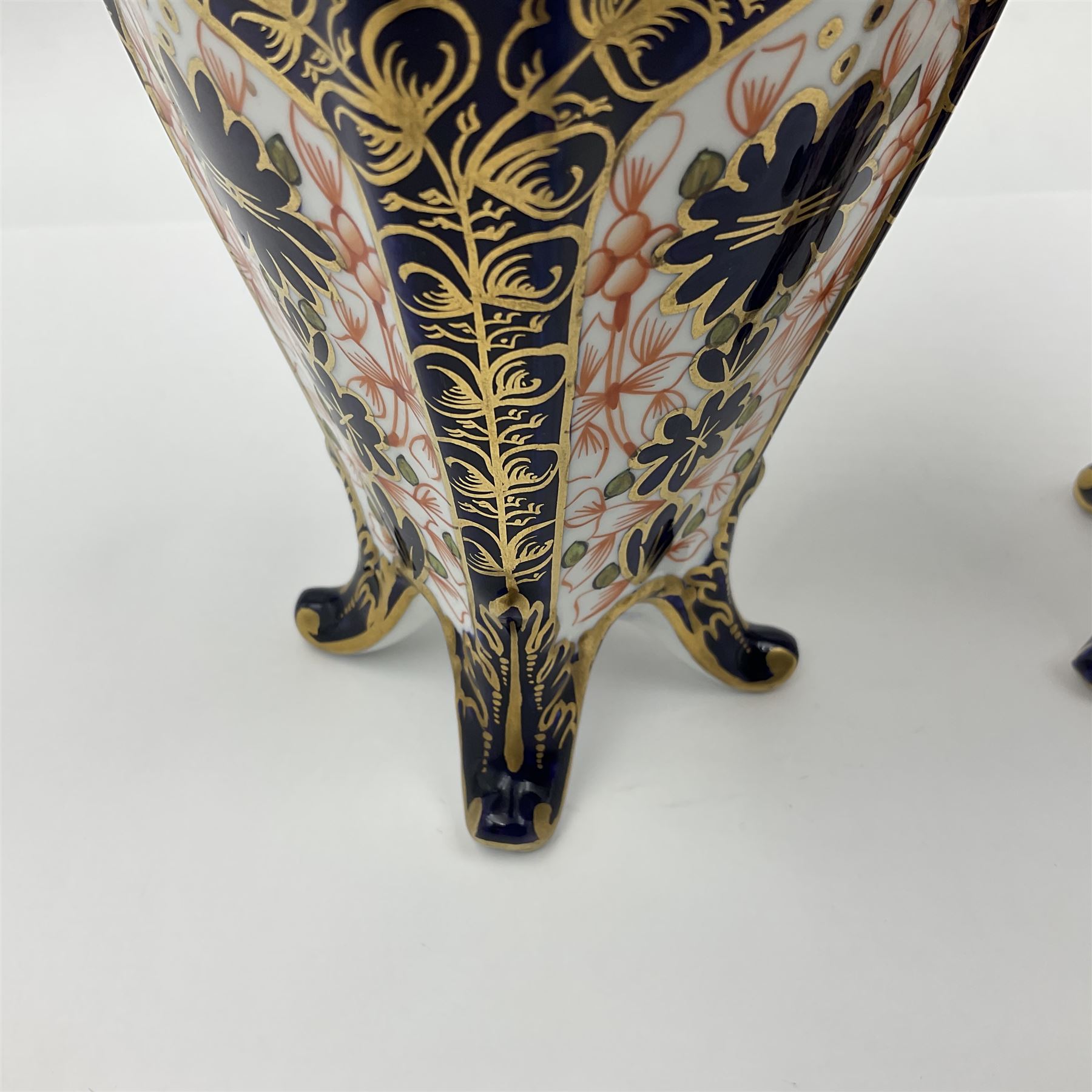 Pair of early 20th century Royal Crown Derby Imari 1128 pattern vases, of tapering straight sided form with waisted neck and frilled rim, upon four splayed feet, with printed and painted marks beneath including illustration date codes for 1911 and 1920, H17cm