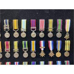 Two limited edition large framed display boards with half-size copies of British Gallantry and Campaign Medals produced by Danbury Mint and entitled 'For Valour'. Sixty medals on each board, all with ribbons. Complete with Danbury Mint certificate serial number A0148 and other paperwork.