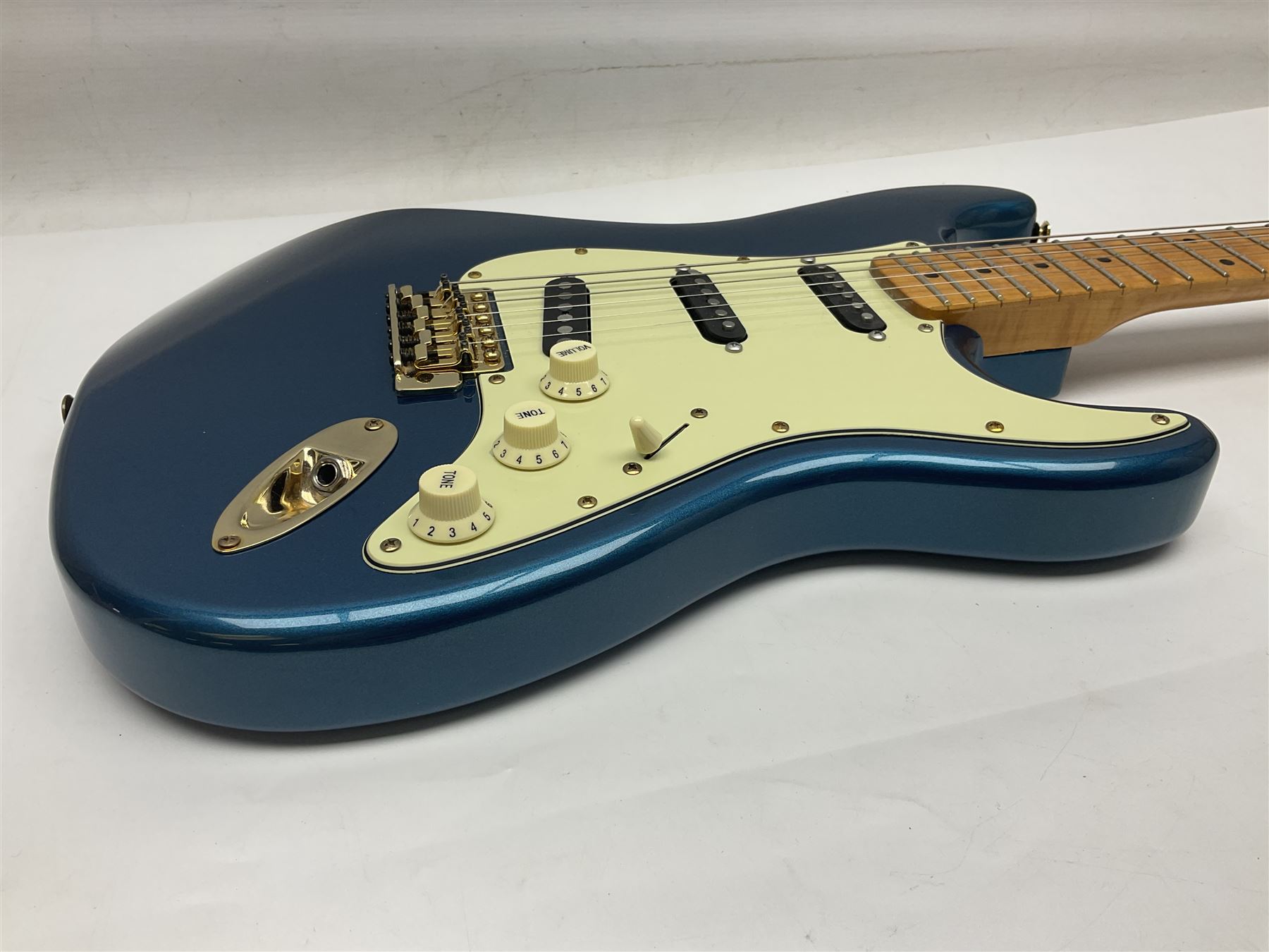 Fender Stratocaster style electric guitar in metallic blue with Rio Grande pick-ups and Fender back-plate L98cm; in Fender soft carrying case