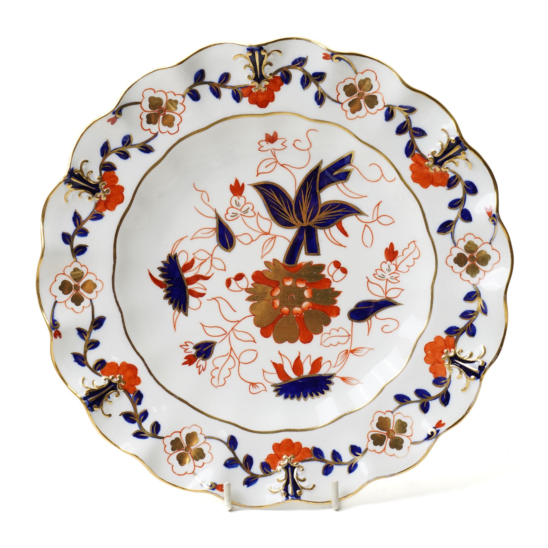 Royal Crown Derby 'Asian Rose' pattern A.962 tea service, comprising tea and coffee pots, open sucrier, milk jug, eight cups and saucers, six side plates, two serving plates, and a boxed Duck with gold stopper