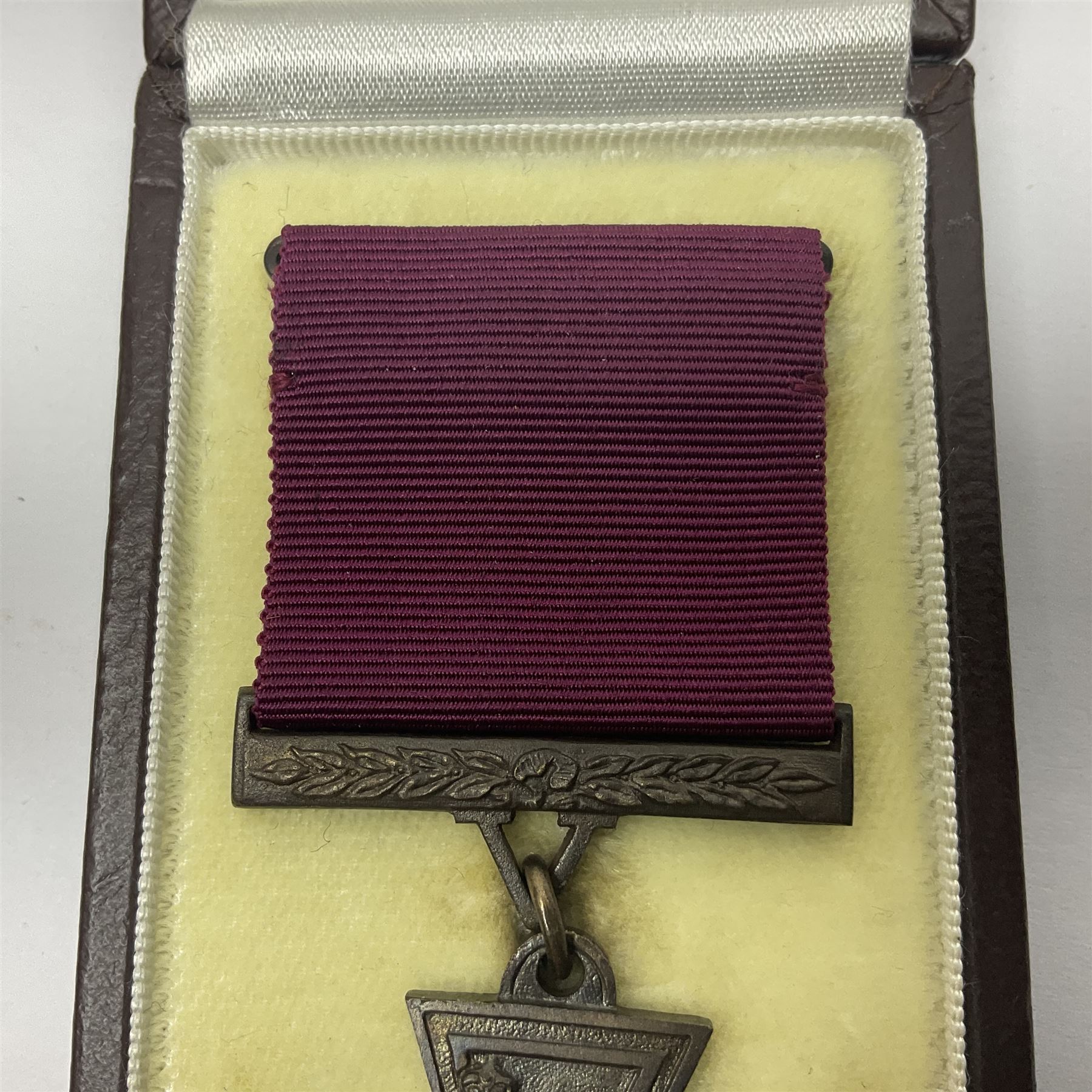 Victoria Cross, an official Hancocks & Co, London replica, the reverse engraved 'Hancocks 36', in fitted leather case of issue; Auctioneer's Note: The Victoria Cross was instituted on 29th January 1856, with the first awards backdated to 1854, and in the first 150 years of its existence was awarded on 1,355 occasions (1,352 Crosses and 3 Second Award Bars). To mark the 150th Anniversary, the London jewellers Hancocks, who have manufactured every Victoria Cross ever awarded, issued a limited edition replica, the replicas all individually numbered on the reverse, with the edition limited to 1,352 replica crosses. The No.36 apparently relates to actions by Capt. A. Henry of the Land Trans Corps at Inkerman 5/11/54 reported in the London Gazette 24/02/57.
