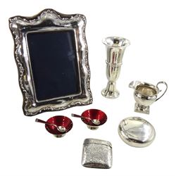 Pair of Danish silver and red enamel salts by Egon Lauridsen, silver mounted photograph frame by Keyford Frames Ltd, London 1990, silver circular snuff box by Horton & Allday, Birmingham 1902, silver vesta case by Eustace George Parker, Birmingham 1896, silver milk and vase, all hallmarked