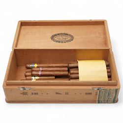 Four Cuban Cohiba cigars, six Montecristo cigars, two Romeo y Julieta and eighteen other C...