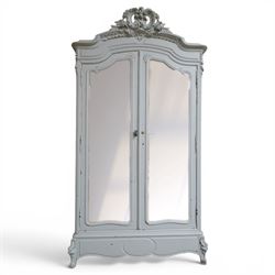 French Louis XV style pale blue painted armoire, with carved floral and foliate crest over a shaped moulded cornice, fitted with two bevelled mirror panel doors enclosing hanging space and drawer, above shaped apron, raised on carved cabriole supports