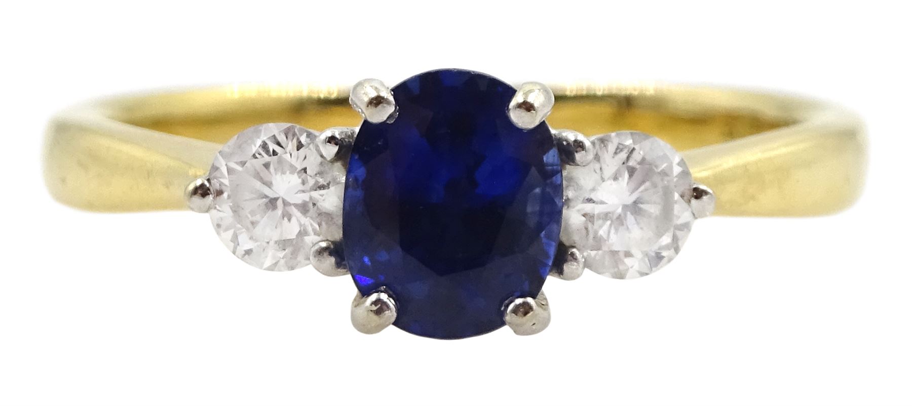 18ct gold three stone oval sapphire and round brilliant cut diamond ring, stamped 18KT, total diamond weight approx 0.30 carat, sapphire approx 0.80 carat