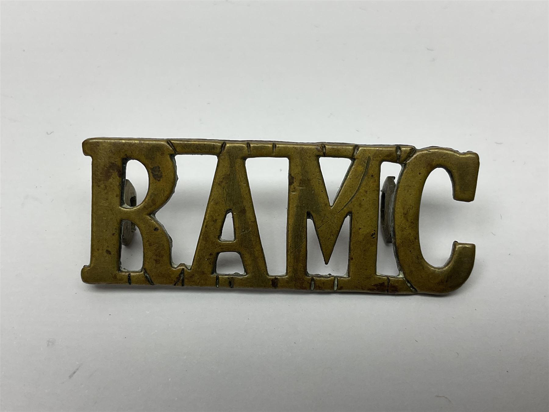 WWI RAMC Military Medal group of four comprising MM awarded to 439278 Pte. R.W. Sainsbury 1/3 S.M.F.A. R.A.M.C. T.F., British War Medal, Victory Medal and 1914-15 Star awarded to 2160 Pte. R.W. Sainsbury R.A.M.C.; all with ribbons; together with RAMC shoulder title
