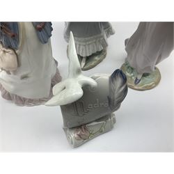 Three Lladro figures, comprising, Dreams of Summer Past no 6401, Spring Breeze no 4936 and Breezy Afternoon 5682 together with Lladro plaque Art Brings us Together no 7677, all in original boxes, largest example H35cm