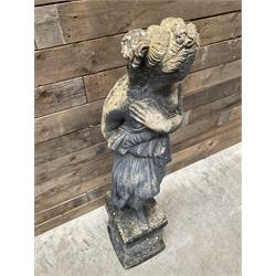 Cast stone weathered garden statue of Venus on pedestal