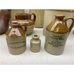 Quantity of salt glazed stoneware flagons, two tone jars and jug etc, to include some with impressed marks and labels, largest H26cm