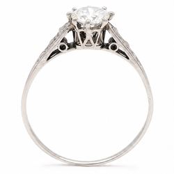 Early 20th century white gold and platinum diamond ring, eight claw set with a single old cut diamond of approx 0.70 carat and rose cut diamond shoulders, stamped PLAT 18ct