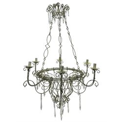 India Jane Interiors - six branch metal chandelier, the scrolled crown over circular bulbous body with six projecting branches, decorated with scroll work and glass pendants, in distressed white paint finish - ex-display/bankruptcy stock 