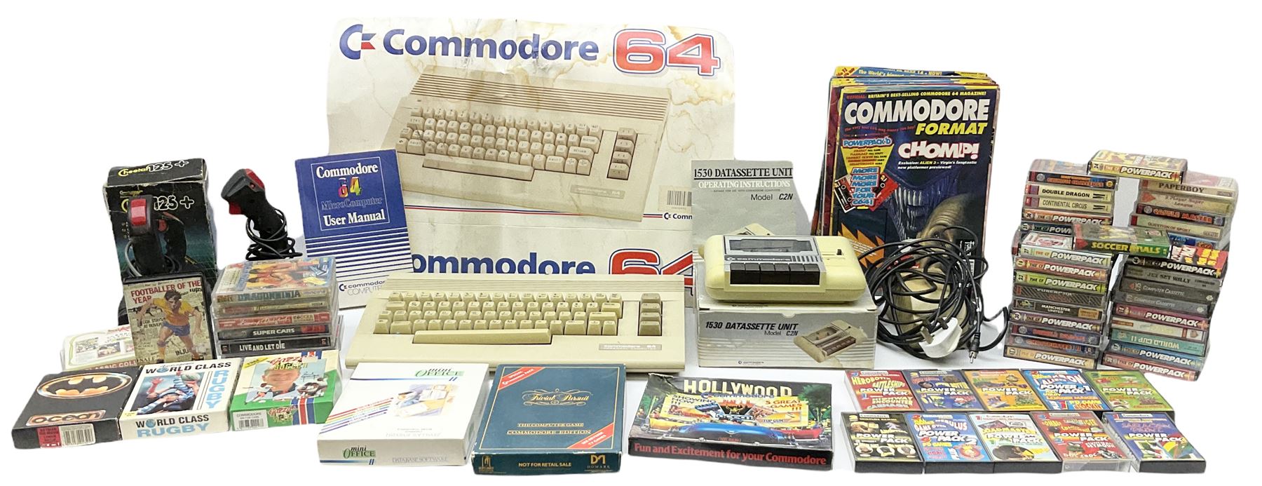 Commodore 64 games computer with boxed 1530 Datassette Unit Model C2N, two joysticks, over seventy games and twenty-two Commodore magazines; polystyrene box inner and card slip-case