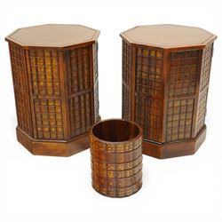 Georgian style pair of octagonal cabinets, the panelled doors modelled as book spines with...