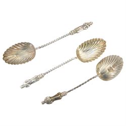 Edwardian silver sauce boat, of typical plain form with shaped rim, with flying C scroll handle and upon three pad feet, hallmarked Birmingham 1907, maker's mark worn and indistinct, together with a pair of Edwardian silver cruets, of urn form, upon three pad feet, hallmarked Horace Woodward & Co Ltd, Birmingham 1905 and a set of six silver apostle spoons, with matching sugar tongs and sugar sifting spoons, some hallmarked Miller Bros, London 1895 and Charles Boynton, all contained within fitted cases