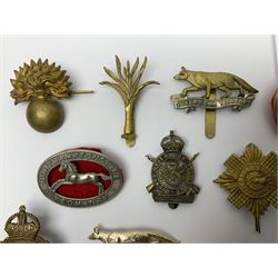 Twenty-six cap badges for Yeomanry and various guards including Fife & Forfar, Lothian and Border Horse, Leicestershire, Northamptonshire, Queens Own, Coldstream, Grenadier, Machine Gun Regiment, Life Guards etc (26)