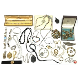A collection of Vintage and later costume jewellery, to include a ladies Gucci wrist watch, a jet pendants, marcasite brooch, Celtic brooch, etc. 