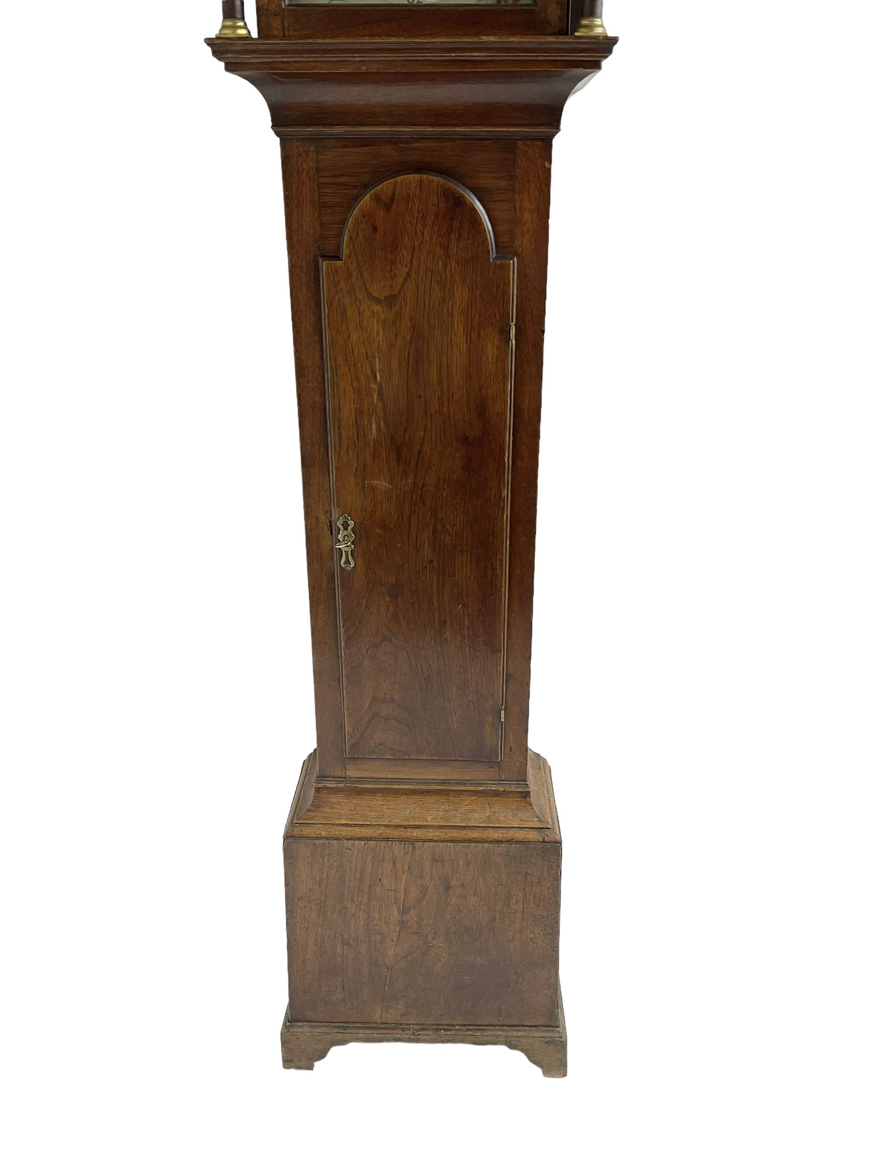 Thomas Wrangles -  early 19th-century oak longcase clock with a swans neck pendulum and three brass finials, glazed hood door flanked by two free standing pilasters, long trunk door with a break-arch top on a square plinth raised on bracket feet, painted dial inscribed T Wrangles Scarboro, dial pinned directly to a 30-hour chain driven count wheel movement striking the hours on a bell.
 With pendulum and weight. 