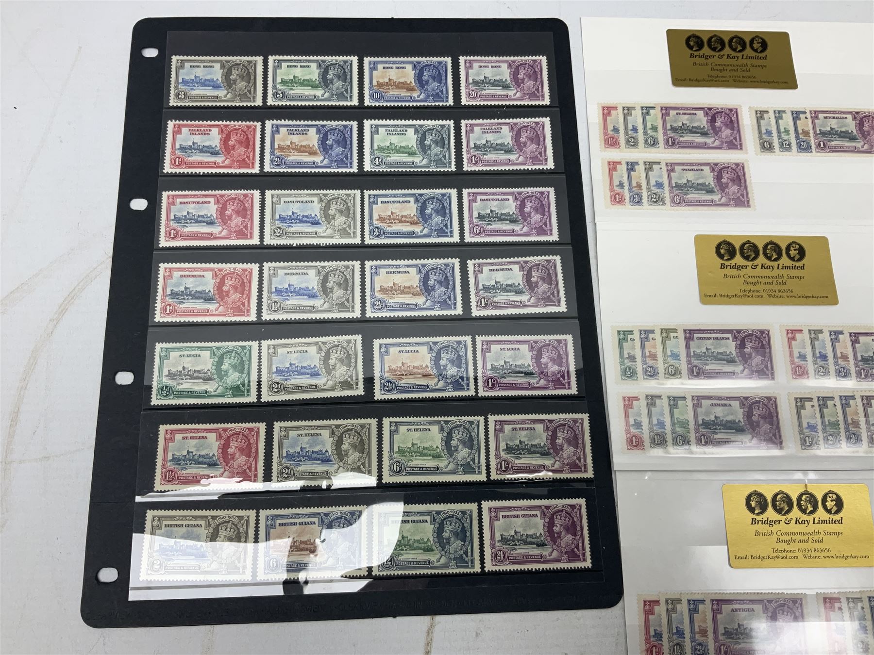 King George V 1910-1935 Silver Jubilee stamps, including Antigua, Basutoland, Cayman Islands, Fiji, Nyasaland, Jamaica, St Helena, Seychelles, Swaziland, St Lucia, British Guiana etc, housed on pages and stockcards 