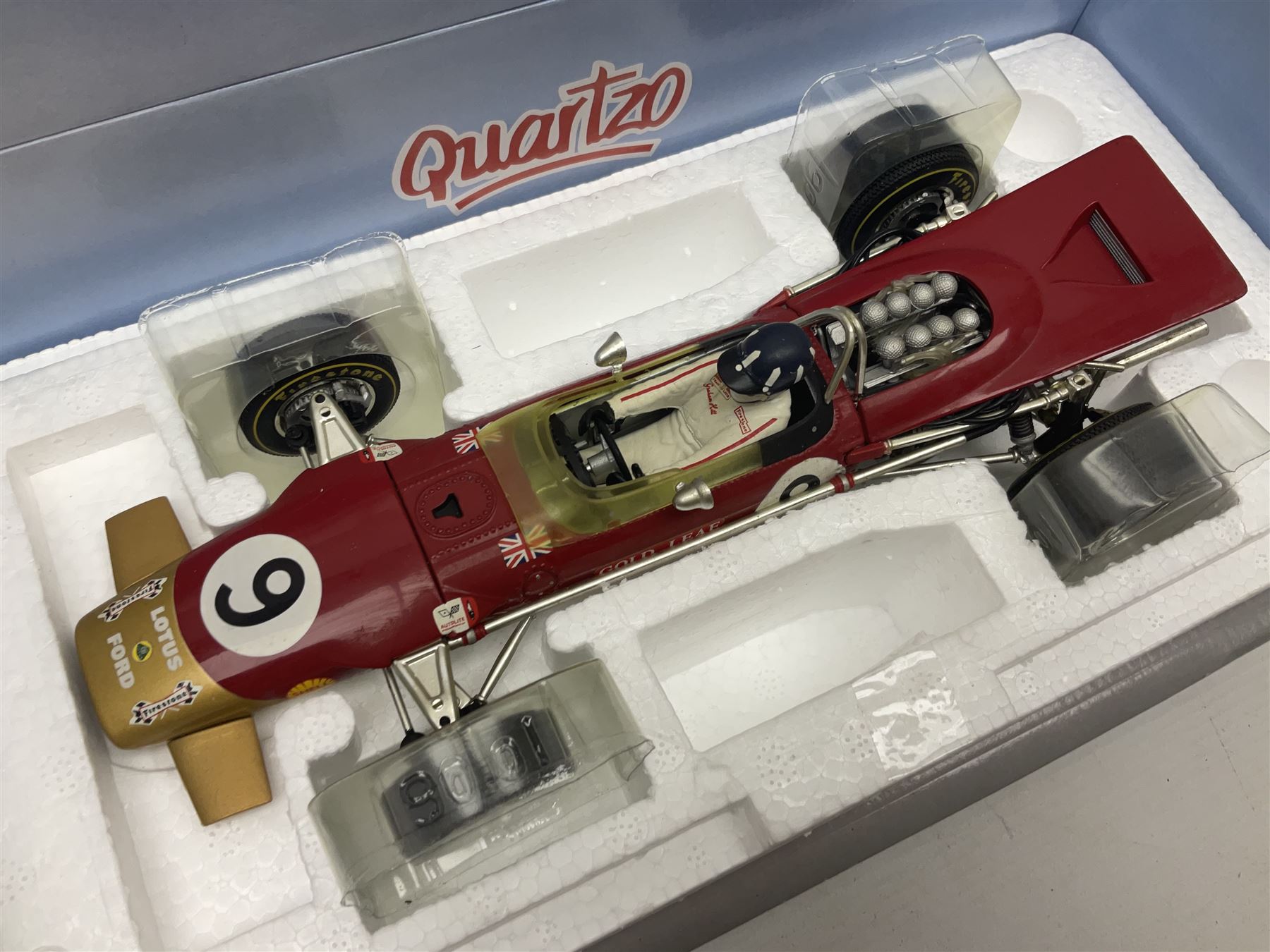 Four Quartzo/A-Model 1:18 scale die-cast racing cars - Lotus 72D 'JPS' Winner British G.P. 72 Emerson Fittipaldi; Lotus 49 Winner British G.P. 67 Jim Clark; Lotus 49B U.S.A. G.P. 68 Mario Andretti; and Lotus 49B Winner Monaco G.P. 68 Graham Hill; all boxed (4)