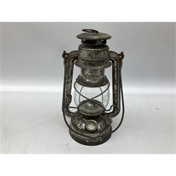 Copper and brass ship’s lamp marked ‘Anchor’, H25cm, Feuer hand storm lantern, Bialaddin Model 315 paraffin lamp and an Anchor lamp (4)