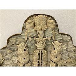 Pair 19th century French Dieppe bone and ivory wall mirrors, the oval bevelled mirror plates within rectangular frames with shaped tops, profusely decorated with ivory leaves, further detailed with carved bone armorial type crest inscribed 'SGOTORVM', putti, fish and mask heads, H81cm W48cm