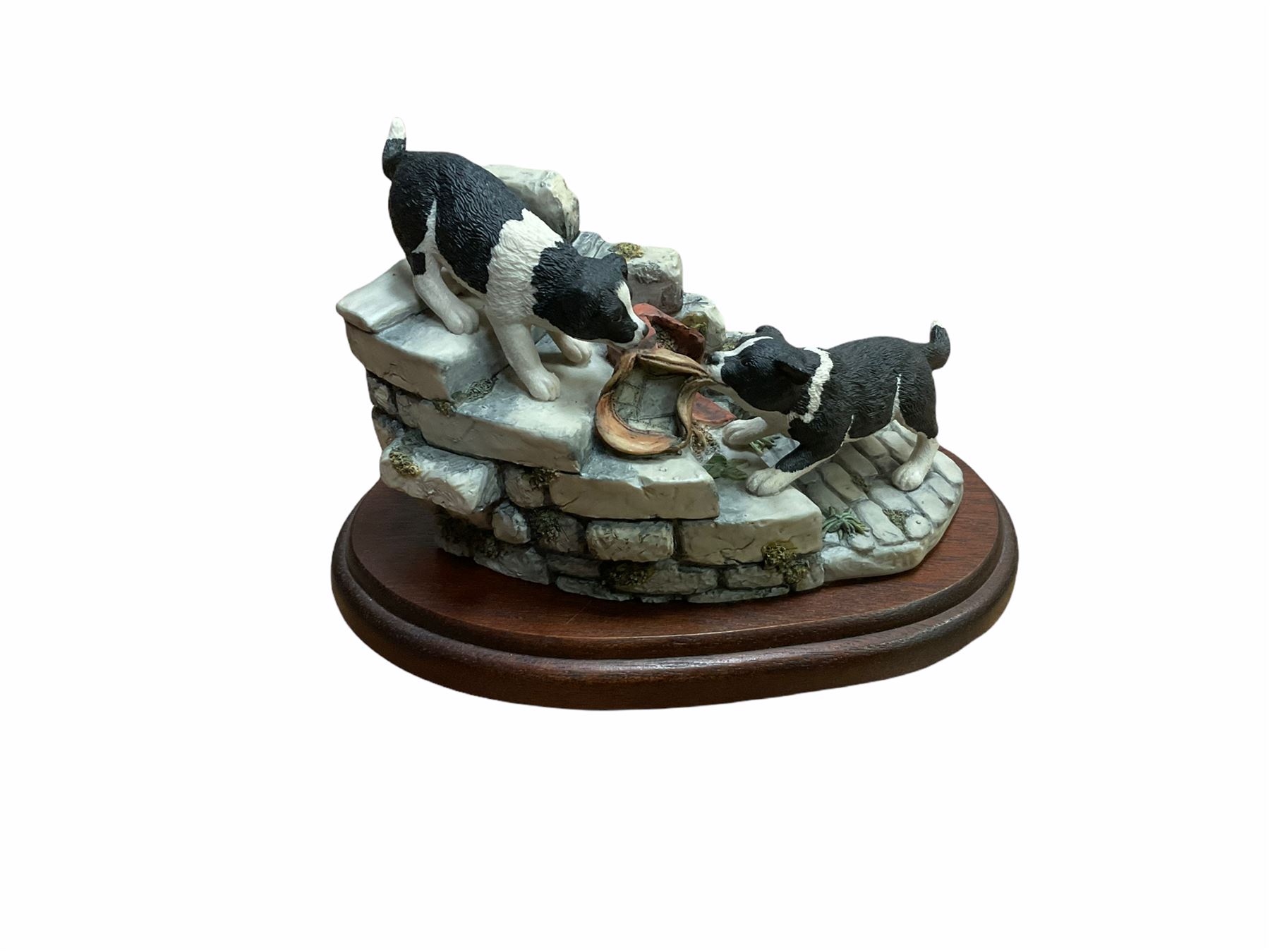 Border fine arts figures, Pick of the litter, model no JH30, by Ray Ayres L26cm, Tug of war, model no JH61, by D Walton H11.5cm and Robin with chicks in boot, model no RB45, by by Ray Ayres H11cm.  