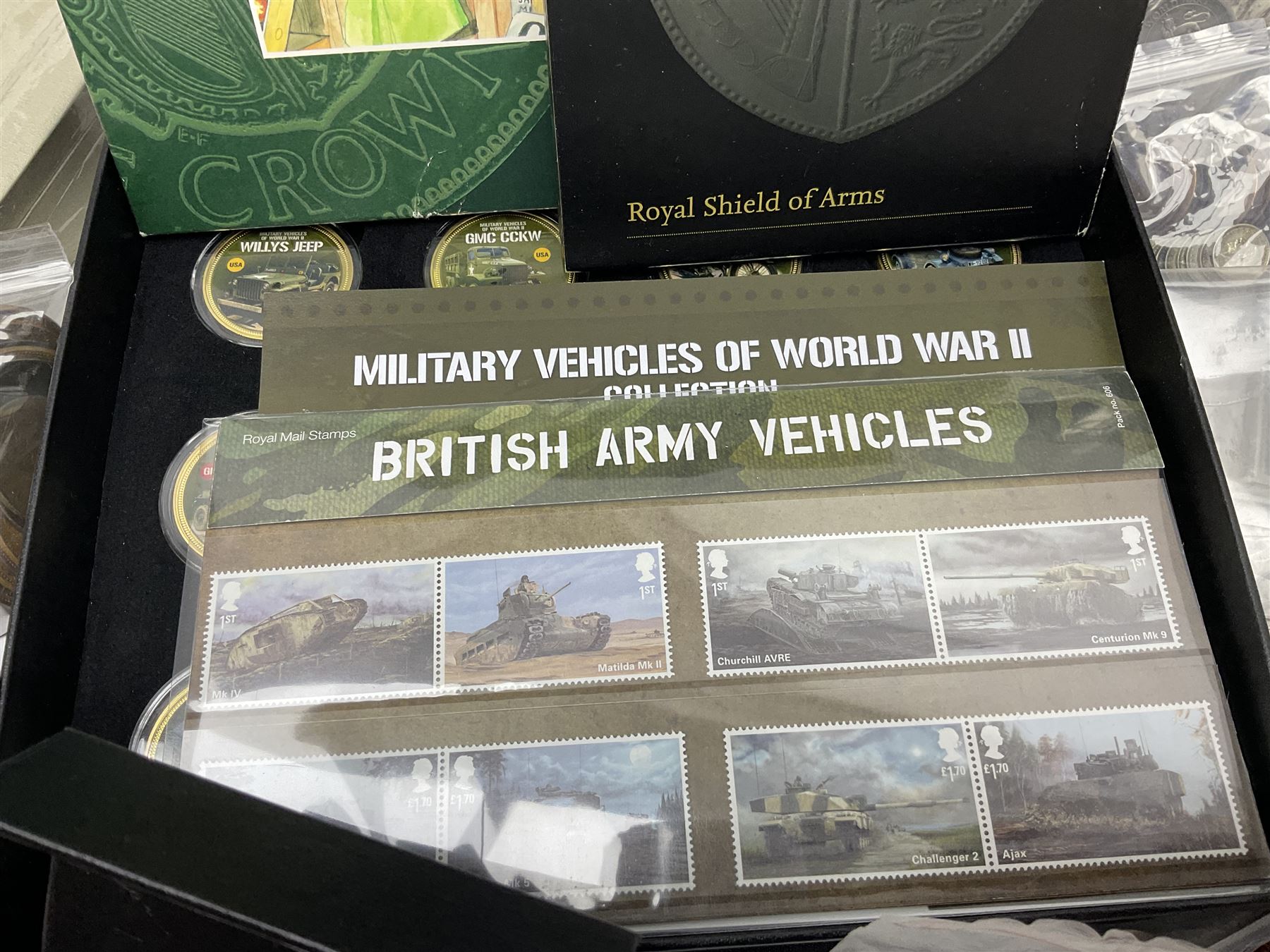 Commemorative and other coinage, including various Queen Elizabeth II 'London 2012 sports collection' fifty pence coins on cards, commemorative crowns, Millennium 2000 'Time Capsule' coin set, channel islands old round one pound coins, part sets etc