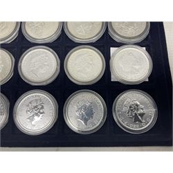 Twenty-four Queen Elizabeth II Britannia one ounce fine silver two pound coins, dated 1998, 1999, 2000, 2001, 2002, 2003, 2004, 2005, 2006, 2007, 2008, 2009, 2010, 2011, 2012, 2013, two 2014, 2015, 2016, 2017, 2018, 2019 and 2020 (24), housed on a coin tray