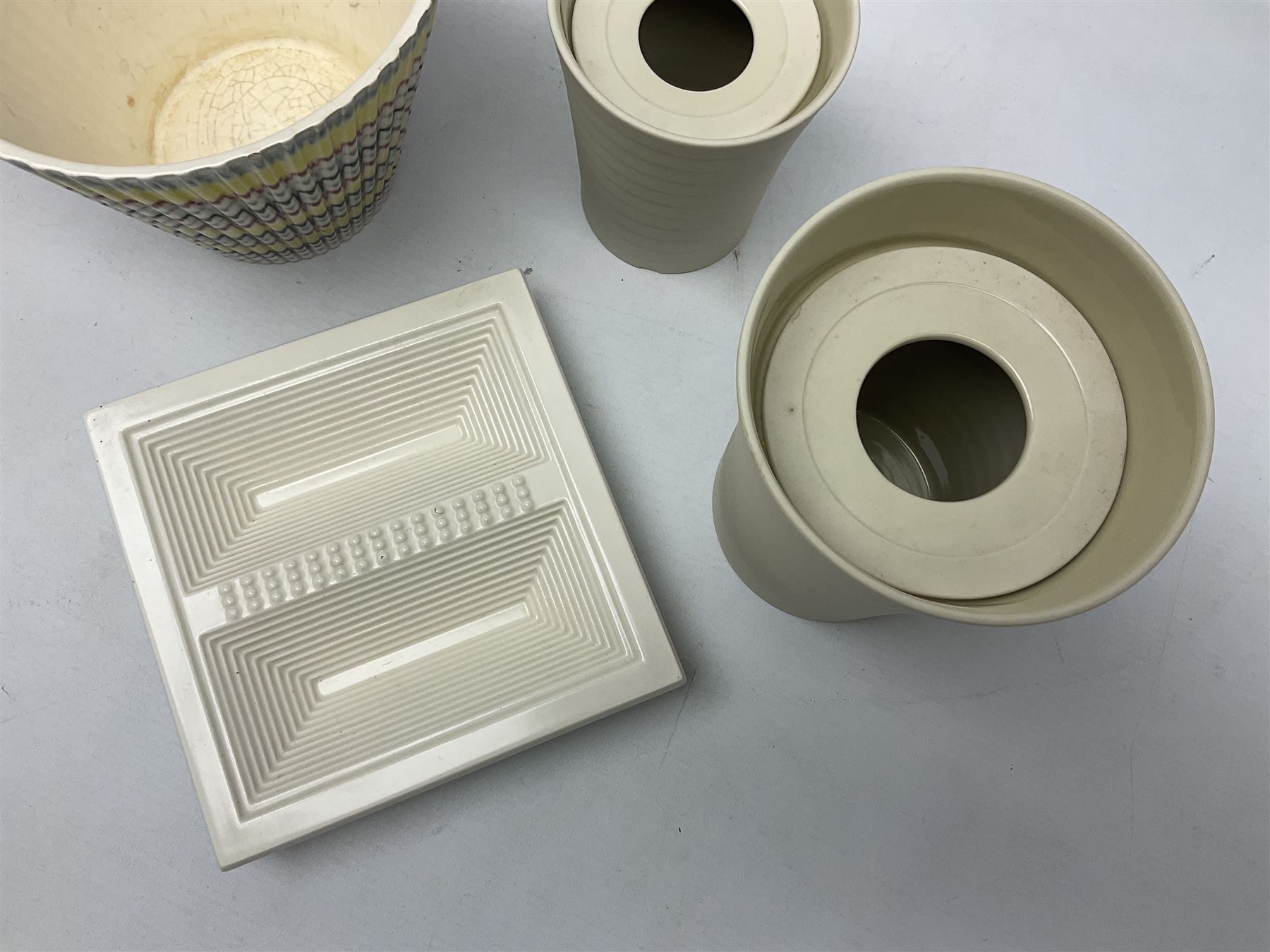 Hornsea Pottery Rainbow planter by John Clappison, together with two Horsea Concept vases with flower holders and Hornsea Stadium dish, largest example H16cm