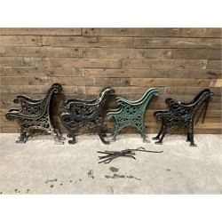 Four pairs of ornate cast iron bench ends (8)