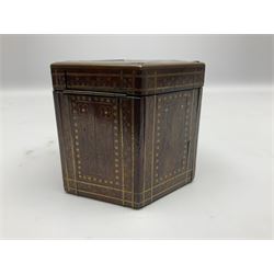 19th century Persian rosewood tea caddy, of hexagonal form, the sides strung and inlaid with brass wire to form panels of flowering urns and flower heads within scalloped borders, the hinged cover similarly strung and inlaid with brass, copper and mother of pearl in the form of a flower head and lozenge border, surrounding an inner circular banded motif, opening to reveal a red stained interior, H9.5cm D12cm