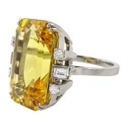 Palladium natural yellow sapphire ring, set with three baguette and round cut diamonds either side, sapphire approx 28.00 carat, with The Gem & Pearl Laboratory report stating no evidence of heat treatment, origin opinion Sri Lanka, colour transparent yellow