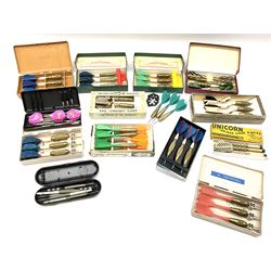Nineteen sets of dartboard darts by Unicorn, Jim Pike, 'One-o-One', Farebrother etc, with various flights, shafts, styles and weights; predominantly boxed