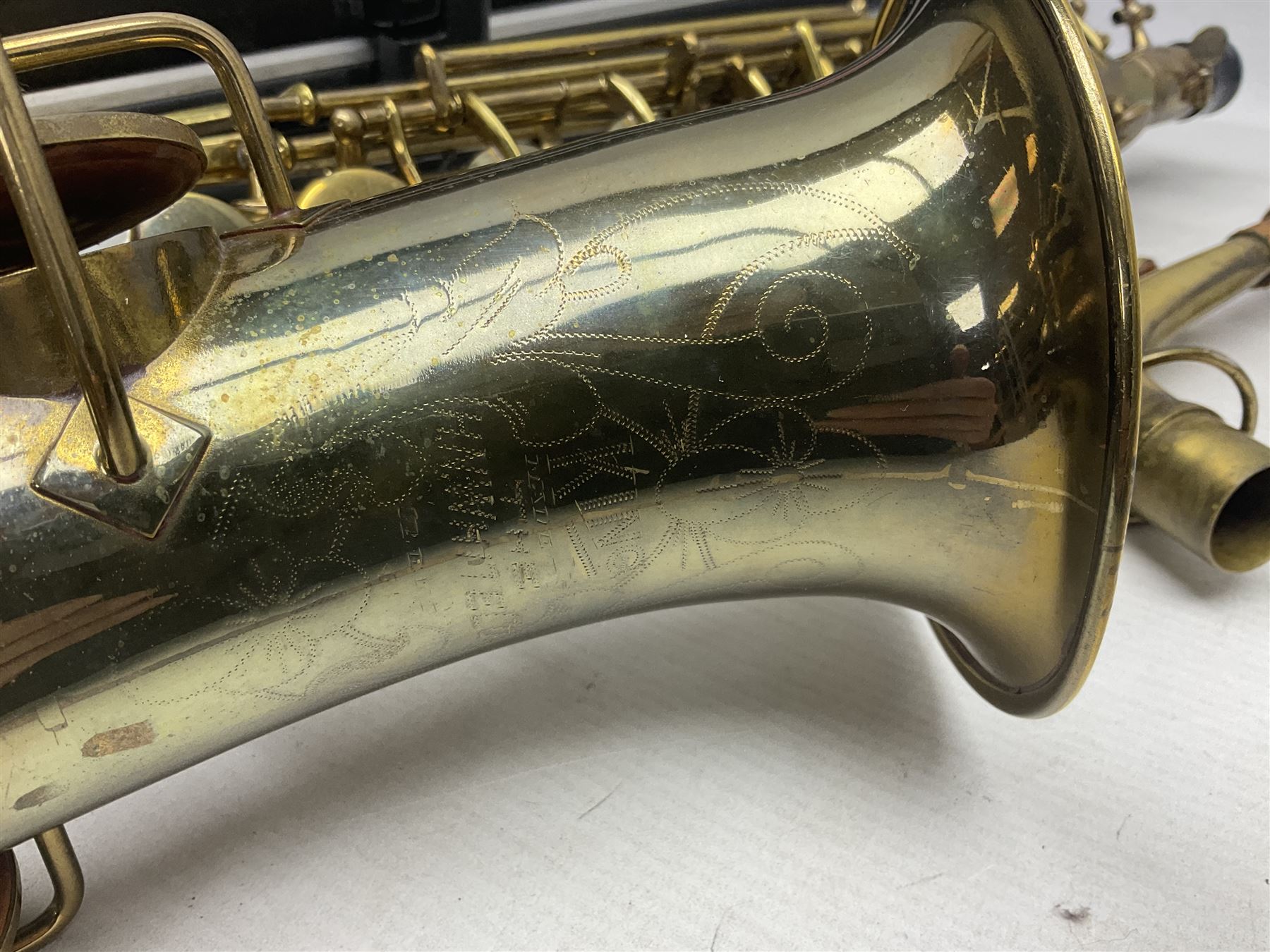 Lacquered brass 'King' alto saxophone inscribed Made by the H.N. White Co.' (Cleveland Ohio) with crook, serial no.84128; also stamped No.1 549 911 and Pat D 8-18-25; in fitted carrying case 