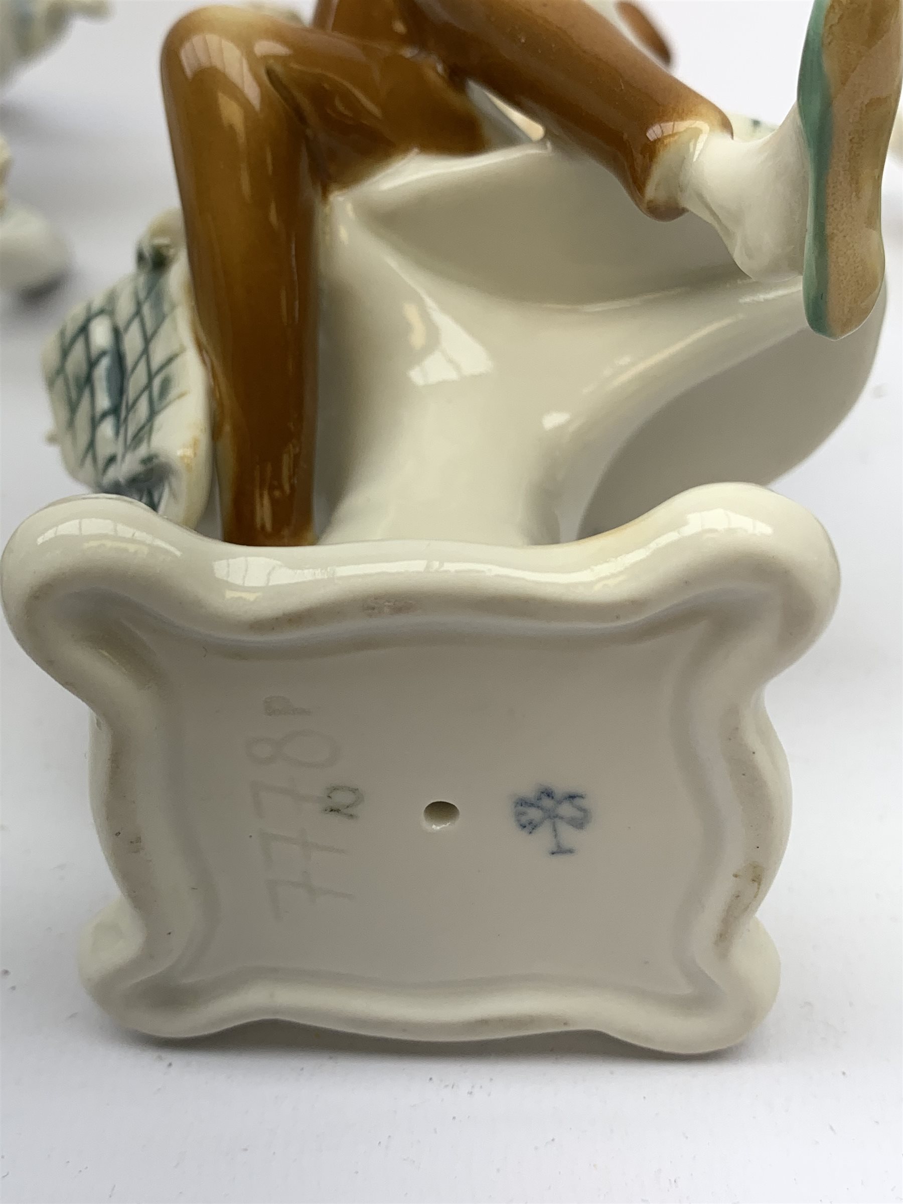 Three 20th century Karl Ens figurines, the first modelled as Uncle Fritz, the second modelled as Bock the Tailor, the third modelled as a sprightly female figure, each with printed blue mark to base, largest H20cm. 